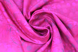 Swirled swatch fuchsia medallion fabric (fuchsia coloured fabric with pink floral appliques and purple polka dots and grey circular paint look marks)