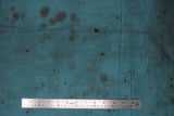 Flat swatch patina fabric (dark turquoise marbled look fabric with subtle grey/black stain and drip marks)