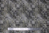 Flat swatch faded tile fabric (busy decorative tile motif allover in white, black, grey collaged with faint black lettering)