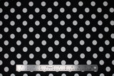 Flat swatch linework themed fabric in pom poms ink (black fabric with medium sized white polka dots)