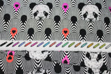 Raw hem swatch linework themed fabric in pandanmonium (panda heads on white and black scalloped stripe pattern with multi-coloured heart badges)
