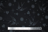 Flat swatch linework themed fabric in fairy flakes ink (black fabric with traditional style birds, hearts, stars, dots in grey)