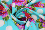 Swirled swatch painted roses wonder fabric (teal blue fabric with white polka dots, tossed pink/orange roses with green leaves dripping with paint look in purple and pink with subtle dark purple polka dots)