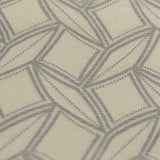 Square swatch of velvet upholstery fabric with abstract squares/diamonds/dots outlines design (white fabric with grey pattern)