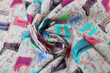 Swirled swatch of spring fabric in rainboots