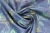 Swirled swatch peacock feather fabric (dark pale blue fabric with sparse green and black peacock feathers allover)