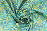Swirled swatch peacock fabric (fan of peacock feathers in bright blue and green shades repeated/scalloped allover)