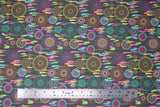 Flat swatch reve fabric (dark grey fabric with bright and pastel coloured dream catchers in various sizes and styles in yellow, green, blue, pink, orange, purple colourway)