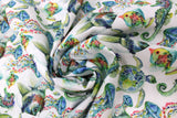 Swirled swatch sea creatures fabric (white fabric with medium sized blue and green coloured sea creatures with pink and yellow floral decor fish, turtles, jellyfish)
