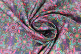 Swirled swatch of Mohican printed fabric in Kaleidoscope
