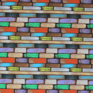 Square swatch Santorin fabric (barn board style fabric arrange in a brick like pattern in grey, brown, orange, purple, green, blue)