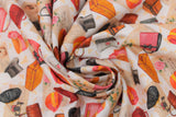 Swirled swatch couturiere fabric (white fabric with faint yellow floral design and tossed yellow and orange hats with pink and yellow floral, tossed black top hats, tossed brown suitcases in various styles, tossed purses/clutches in various styles, tossed letters)