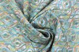 Swirled swatch Kruger fabric (teal and green patterned fabric with orange and white accents all in a flowing swoopy DNA-like pattern)
