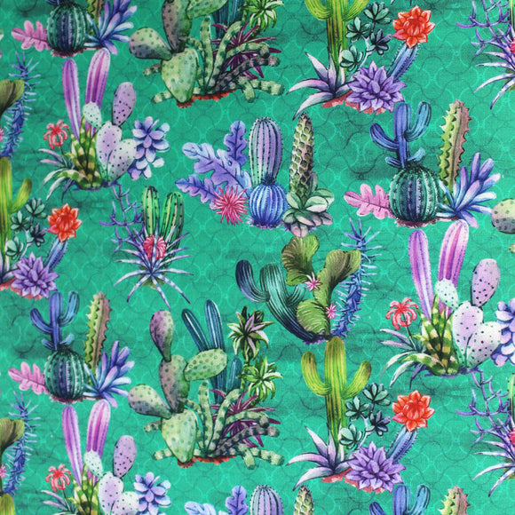 Swatch of cactus printed fabric on teal