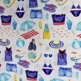 Swatch of cartoon beach/swim printed fabric on white