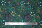 Flat swatch kijani 3 fabric (dark green fabric with large floral heads in white and green and green, blue, pink greenery with tossed large swallow style birds)