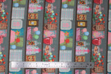 Flat swatch stocked fabric (pale grey/green fabric with brown shelf lines with colourful and decorative candies and jars, coffee tins, lollipops, etc.)