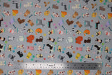 Flat swatch cats & dogs fabric (grey fabric with small cartoon coloured cats & dogs in different breeds/styles, tossed paw prints in rainbow colours and bones)