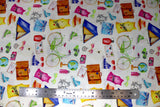 Flat swatch of cartoon camping printed fabric on white