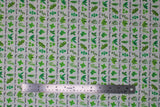 Flat swatch garden fabric (white fabric with small lines/stripes of green herbs and spices in various styles and their corresponding name/title beneath in tiny black cursive)