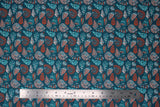 Flat swatch shells fabric (dark teal blue fabric with collaged shells allover in white, red, and teal line drawings)
