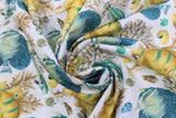 Swirled swatch fish & shells fabric (white fabric with large yellow, blue and teal fish with tossed yellow, brown, green, blue shells, and brown/blue coral in background)
