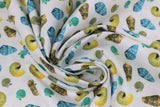 Swirled swatch shells fabric (white fabric with small tossed beach look shells allover in various styles in blue, green, yellow, natural colourway)