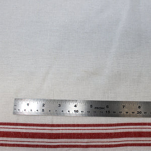 Group swatch tea towelling material in a variety of stripe colour accents on white