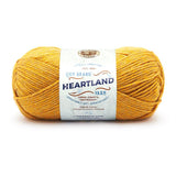 Ball of Lion Brand Heartland in colourway Yellowstone (mustard yellow with slight beige marl look)