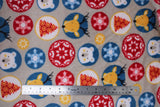 Flat swatch (side 2) Grizzly fabric (light grey fabric with circular christmas ball look ornaments allover in white, red and blue with cartoon woodland creates in some: deer, bears, snowflakes and christmas related prints/emblems in the others)