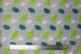 Flat swatch (side 2) Blinky fabric (grey fabric with scattered lines of leaves in green and white shades)