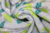 Swirled swatch (side 2) Blinky fabric (grey fabric with scattered lines of leaves in green and white shades)