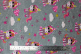 Flat swatch (side 1) Lisou fabric (grey fabric with pink and purple cartoon style unicorns tossed with white clouds and pink/purple and gold stars)