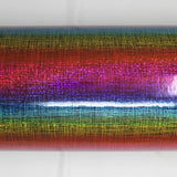 Roll of iridescent rainbow coloured PVC with grid pattern