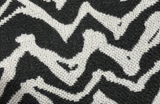 Square swatch upholstery fabric with zebra like print in smoke grey (white with dark grey stripes/pattern)