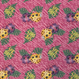 Square swatch Shopkins fabric (light/medium pink animal stripes fabric with green leaves, tossed cookies, and "SPK VIBES" yellow text)