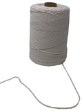 A side view of a spool of white elastic twine with some of the twine unwound to demonstrate thickness