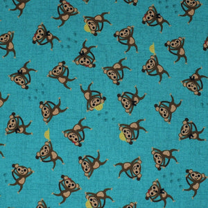 Square swatch Coco's Safari - monkey fabric (aqua blue fabric with tossed cartoon style monkeys in brown shades with yellow hats)