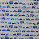 Square swatch Handworks Home: Transportation fabric (white fabric with thin dotted black lines/stripes comprising a "road" with assorted blue illustrative style vehicles allover in various styles/shades of blue)