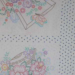 Square swatch Baskets of Blooms: Stitch fabric (white fabric with widely spaced grid lines in blue loosely tossed heart look shapes with outlined colourful floral, baskets and insects)