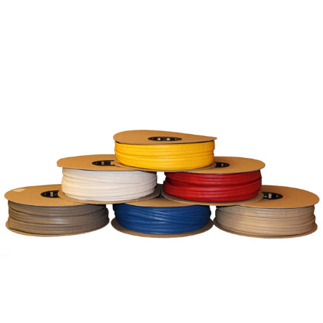Small rolls of vinyl strapping stacked in pyramid form (Bottom Row: Tan, Blue, Beige, Middle Row: White, Red, Top Row: Yellow)