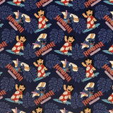 Square swatch Lilo & Stitch fabric (navy fabric with light blue leaves background and tossed Lilo & Stitch characters on surfboards, "Hawaii" text in red)