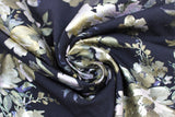 Swirled swatch Floral fabric (black fabric with large tossed floral heads and stems/greenery in white, grey, pale greens and blue shades)