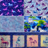 Group swatch assorted Unicorn Dream themed fabrics in various styles/colours