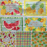 Group swatch assorted Squeeze The Day themed fabrics in various styles/colours