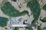 Flat swatch Peacock Arbour fabric (natural coloured fabric with floral background and large tossed illustrative style peacocks in full colour)