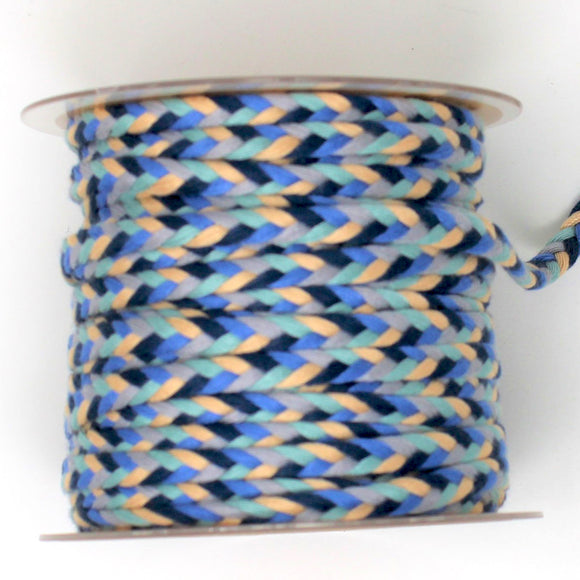 Multi-coloured braided cord on spool