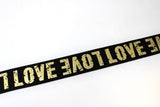 "LOVE" elastic in gold