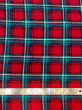 Flat swatch winter themed flannel in Christmas flannel (red/green/blue/white plaid squares)