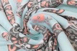 Swirled swatch patterned elephants fabric (light baby blue fabric with dark grey elephants with grey, blue, and pink paisley look pattern within and tossed floral appliques)